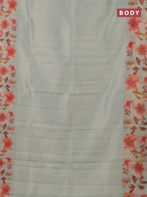 Tissue saree pastel green with allover zari weaves and floral digital printed border