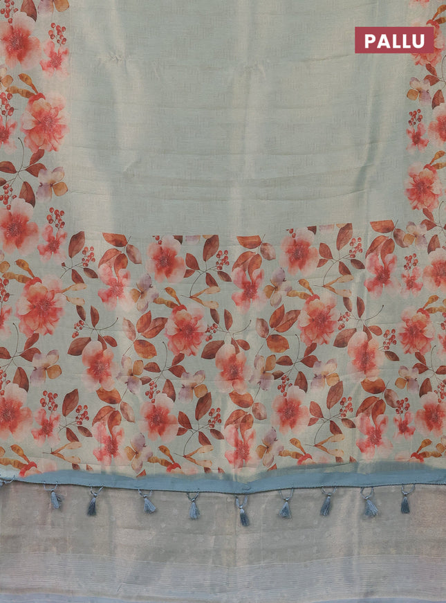 Tissue saree pastel green with allover zari weaves and floral digital printed border