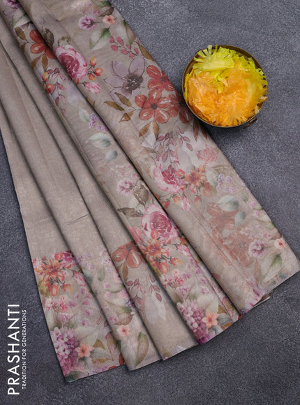 Tissue saree beige with allover zari weaves and floral digital printed border