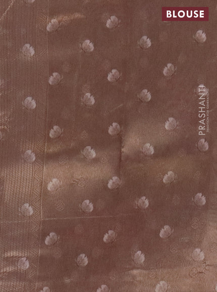 Tissue saree beige with allover zari weaves and floral digital printed border