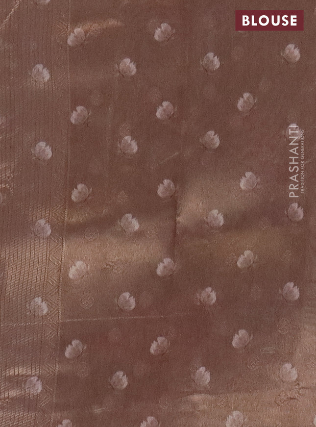 Tissue saree beige with allover zari weaves and floral digital printed border