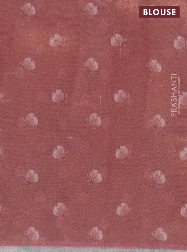 Tissue saree pastel peach with allover zari weaves and floral digital printed border