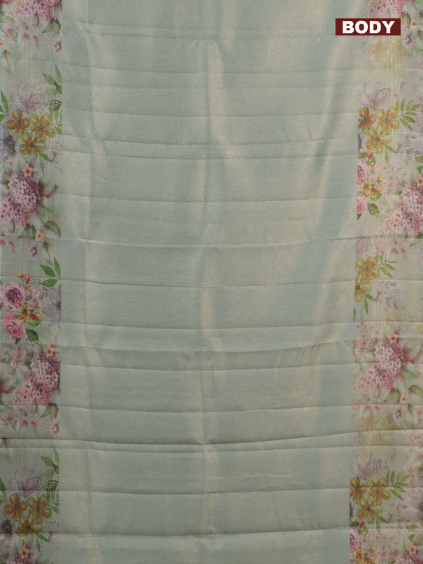 Tissue saree pastel green with allover zari weaves and floral digital printed border