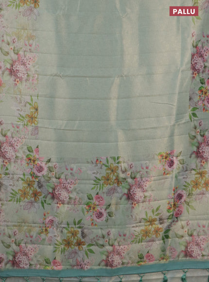 Tissue saree pastel green with allover zari weaves and floral digital printed border