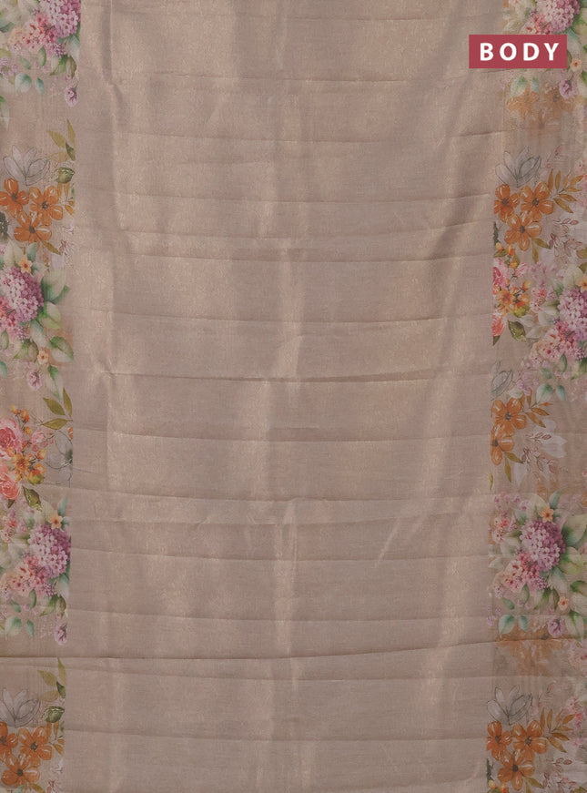 Tissue saree beige and green shade with allover zari weaves and floral digital printed border