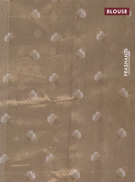 Tissue saree beige and green shade with allover zari weaves and floral digital printed border