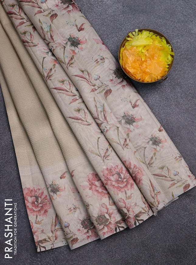 Tissue saree beige with allover zari weaves and floral digital printed border