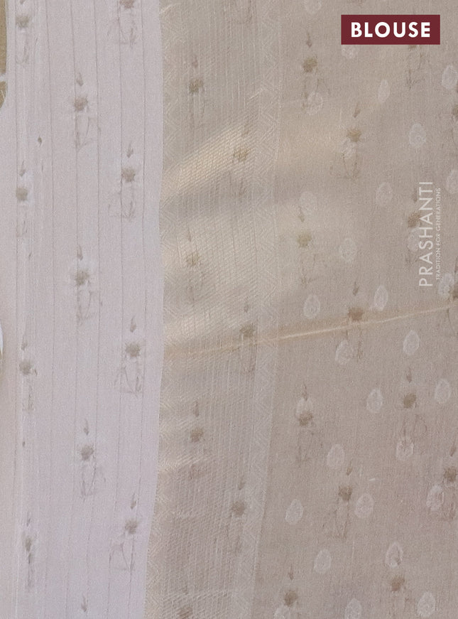 Tissue saree beige with allover zari weaves and floral digital printed border