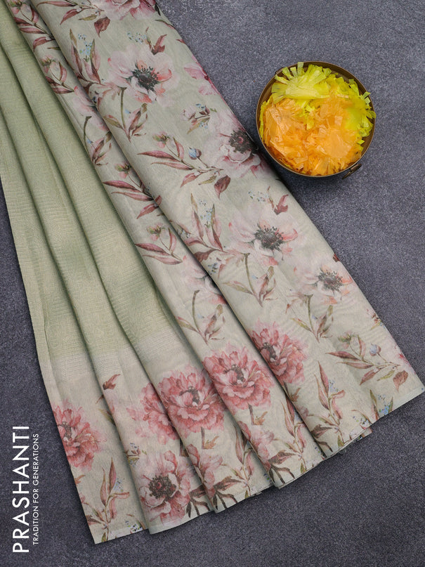 Tissue saree pista green with allover zari weaves and floral digital printed border