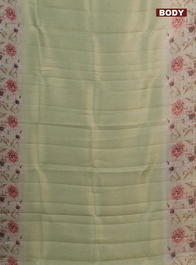 Tissue saree pista green with allover zari weaves and floral digital printed border