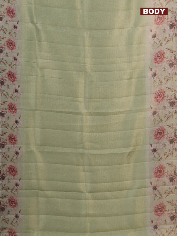 Tissue saree pista green with allover zari weaves and floral digital printed border