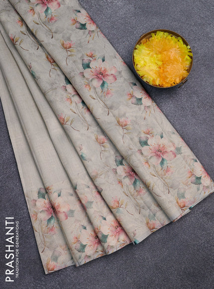 Tissue saree beige with allover zari weaves and floral digital printed border