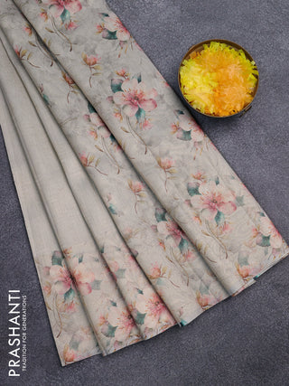 Tissue saree beige with allover zari weaves and floral digital printed border