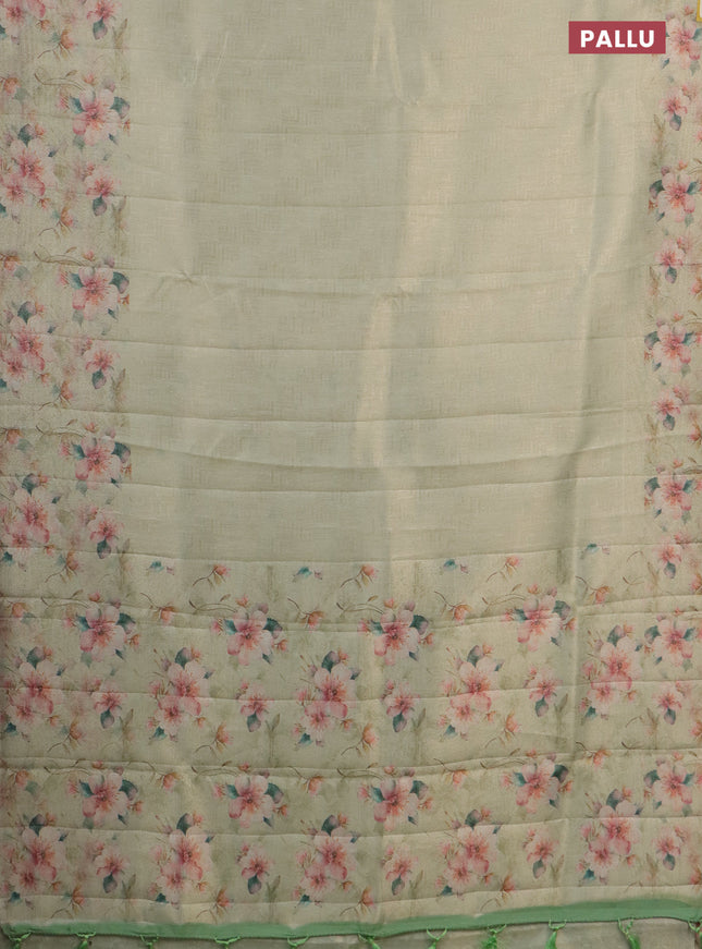 Tissue saree pista green with allover zari weaves and floral digital printed border