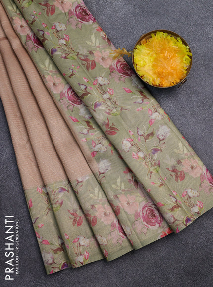 Tissue saree mild peach and pista green with allover zari weaves and floral digital printed border