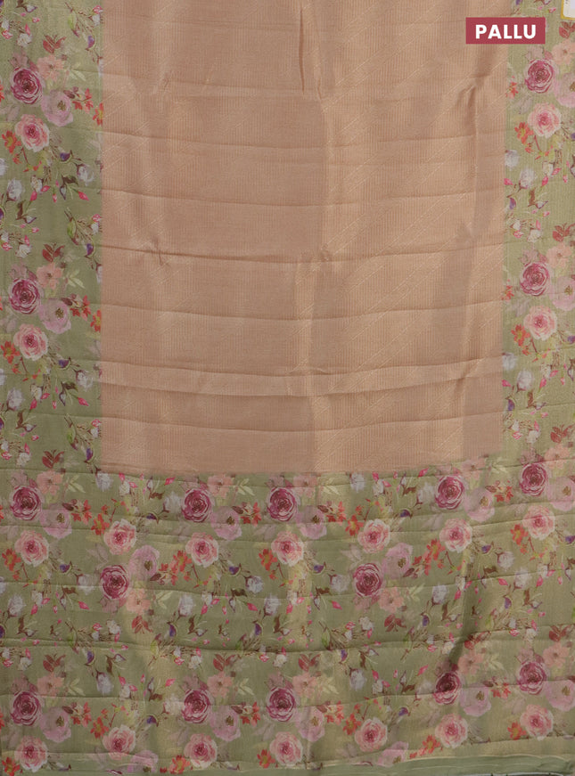 Tissue saree mild peach and pista green with allover zari weaves and floral digital printed border