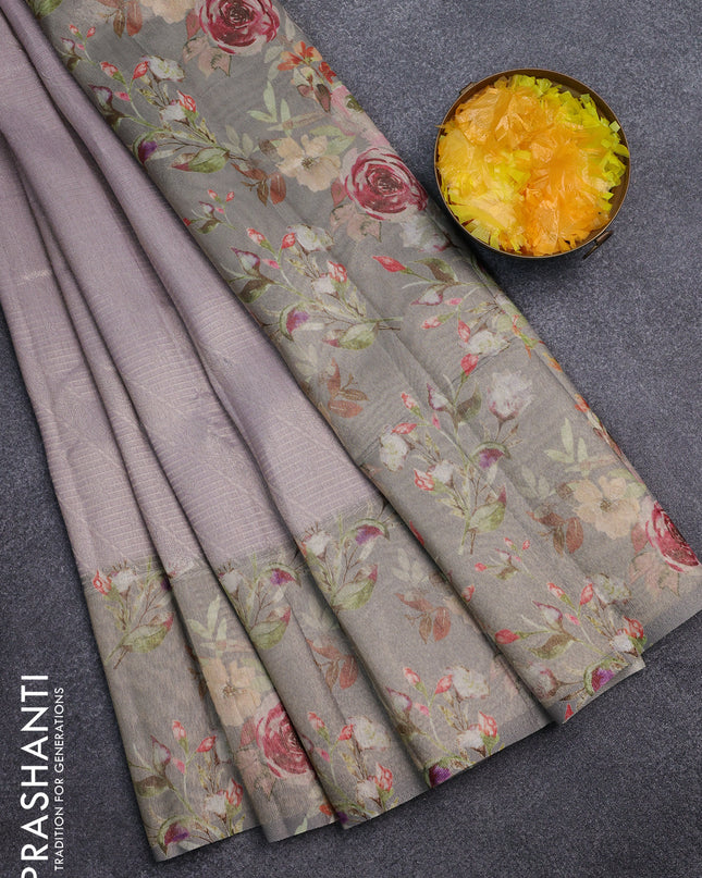Tissue saree mild lavender and grey with allover zari weaves and floral digital printed border