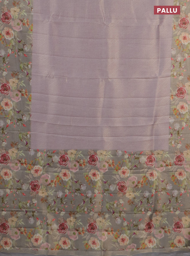 Tissue saree mild lavender and grey with allover zari weaves and floral digital printed border