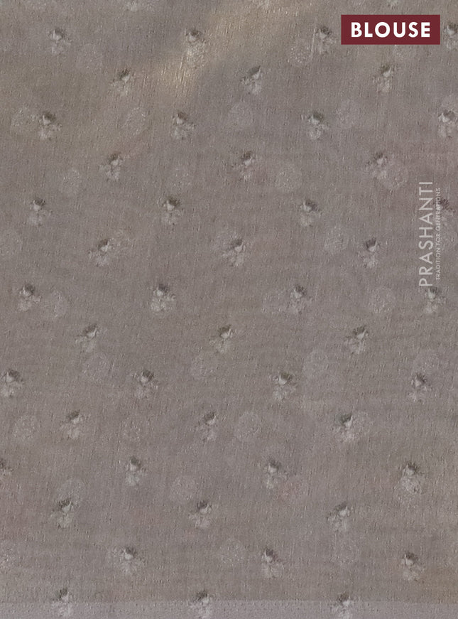 Tissue saree mild lavender and grey with allover zari weaves and floral digital printed border