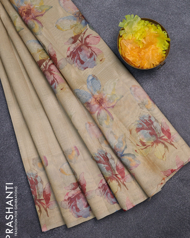 Tissue saree sandal and pale orange with allover zari weaves and floral digital printed border