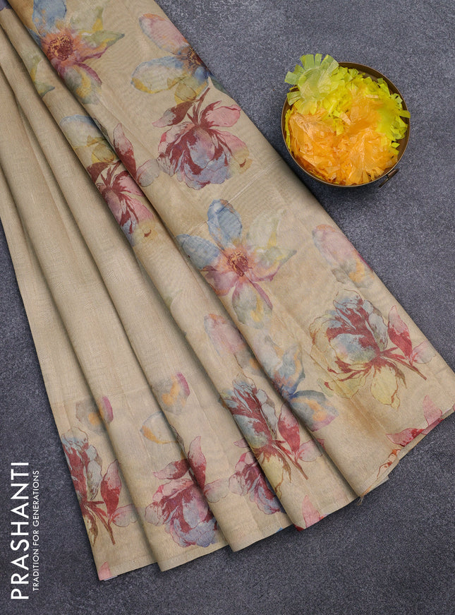 Tissue saree sandal and pale orange with allover zari weaves and floral digital printed border