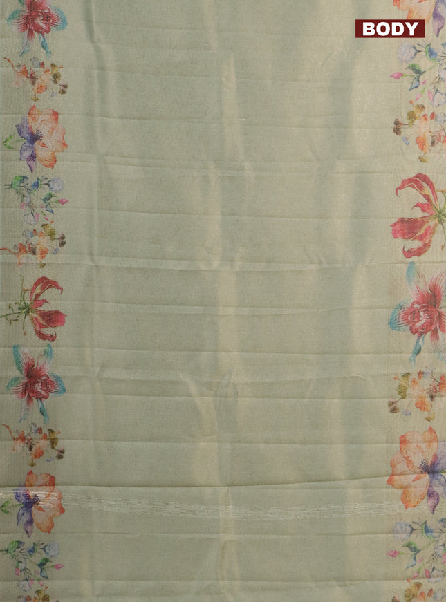 Tissue saree pista green with allover zari weaves and floral digital printed border