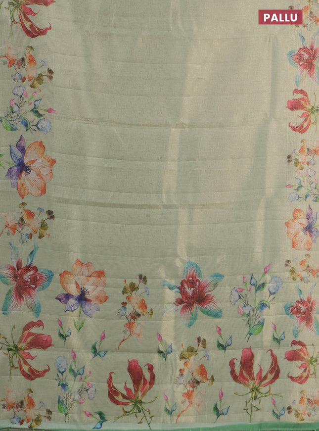 Tissue saree pista green with allover zari weaves and floral digital printed border