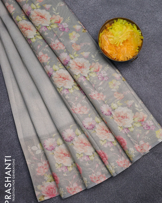 Tissue saree grey shade with allover zari weaves and floral digital printed border