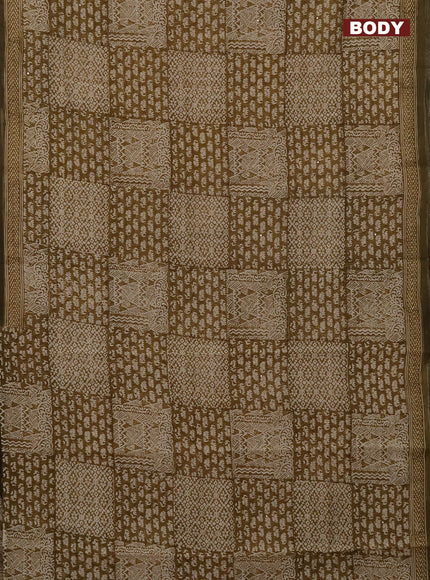 Chanderi silk cotton saree mustard green shade and beige with allover prints & mirror work and printed border