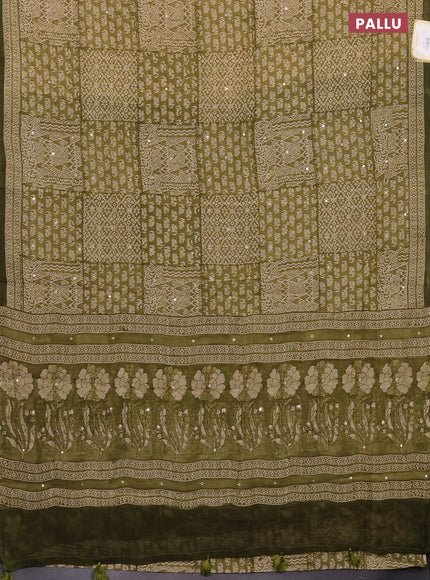 Chanderi silk cotton saree mehendi green and beige with allover prints & mirror work and printed border