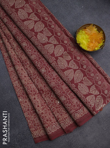 Chanderi silk cotton saree pastel maroon and beige with allover prints & mirror work and printed border