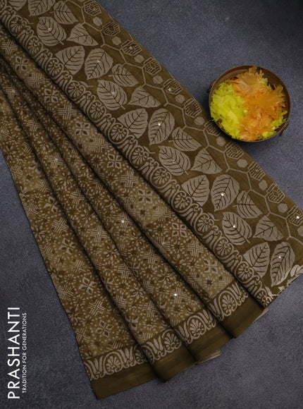 Chanderi silk cotton saree mustard green with allover prints & mirror work and printed border
