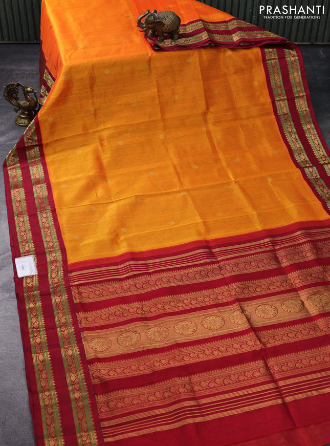 Silk cotton saree orange and maroon with zari woven buttas and rettapet zari woven korvai border
