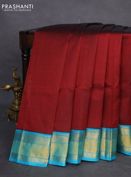 Kuppadam silk cotton saree maroonn and teal blue with plain body and rich zari woven border
