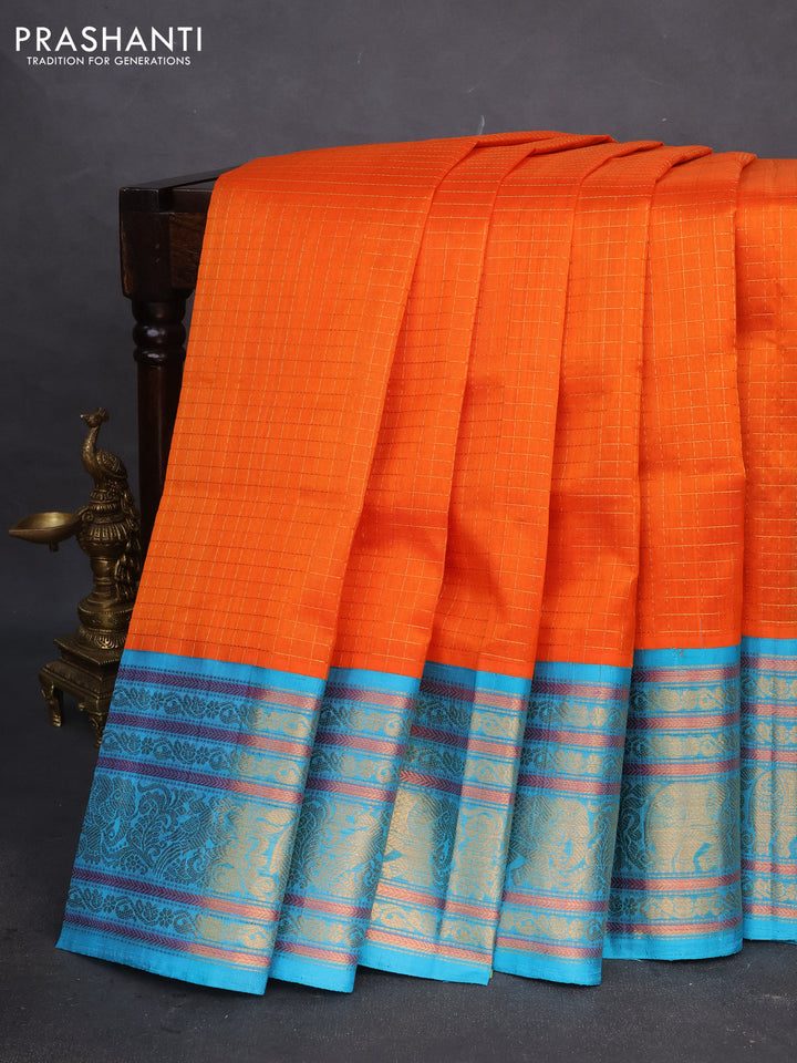 Kuppadam silk cotton saree orange and teal blue with allover small zari checked pattern and long zari woven border