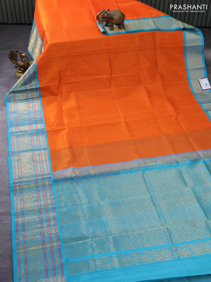 Kuppadam silk cotton saree orange and teal blue with allover small zari checked pattern and long zari woven border