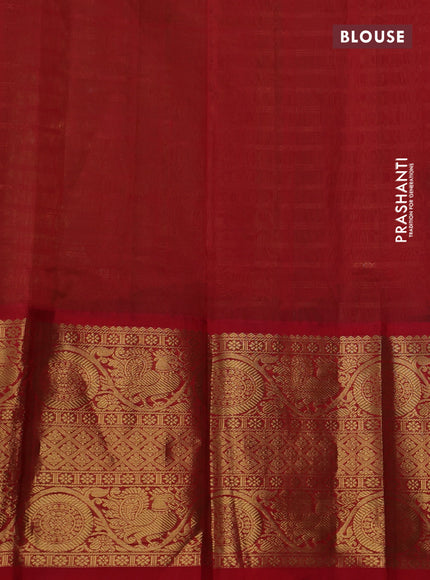 Kuppadam silk cotton saree green and red with allover zari woven stripes pattern and long zari woven border
