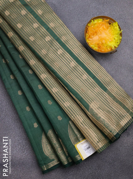 Semi raw silk saree bottle green with allover zari woven 1000 buttas and paisley zari woven butta border