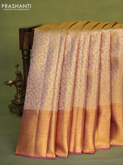 Pure kanchipuram tissue silk saree dual shade of gold and mauve pink with allover zari woven brocade weaves and long zari woven border