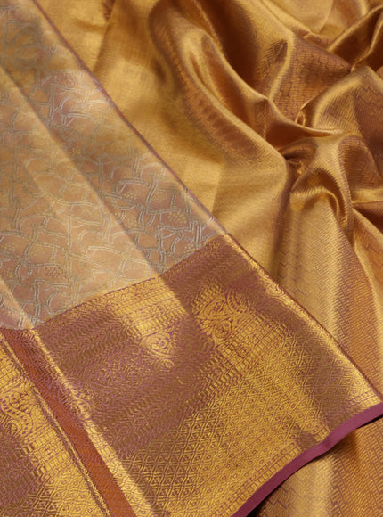 Pure kanchipuram tissue silk saree dual shade of gold and mauve pink with allover zari woven brocade weaves and long zari woven border