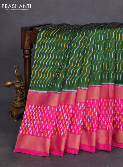 Pochampally silk saree green and pink with allover ikat weaves and long zari woven ikat border