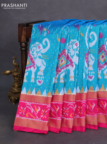 Pochampally silk saree teal bluish green and pink with allover ikat weaves and temple design zari woven ikat border