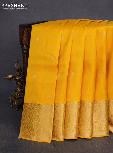 Pure kanchipuram silk saree yellow with zari woven buttas and long zari woven border