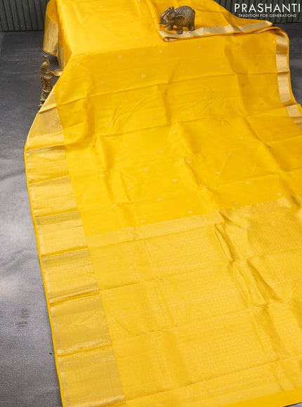 Pure kanchipuram silk saree yellow with zari woven buttas and long zari woven border