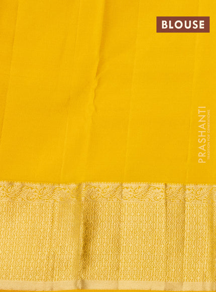 Pure kanchipuram silk saree yellow with zari woven buttas and long zari woven border