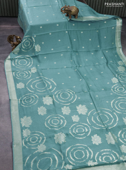 Banarasi silk saree pastel blue shade with allover zari weaves and zari woven border