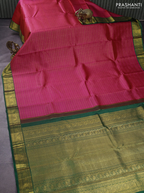 Pure kanchipuram silk saree dual shade of pink and green with allover zari weaves and zari woven korvai border