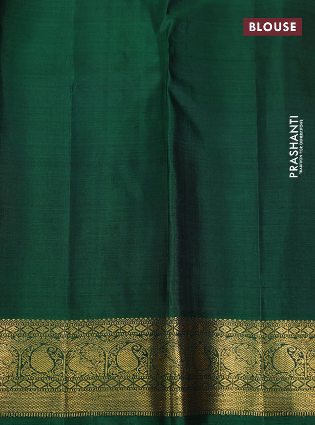 Pure kanchipuram silk saree dual shade of pink and green with allover zari weaves and zari woven korvai border