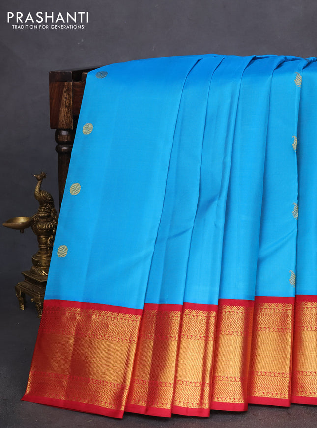 Pure kanchipuram silk saree cs blue and maroon with zari woven buttas and zari woven korvai border