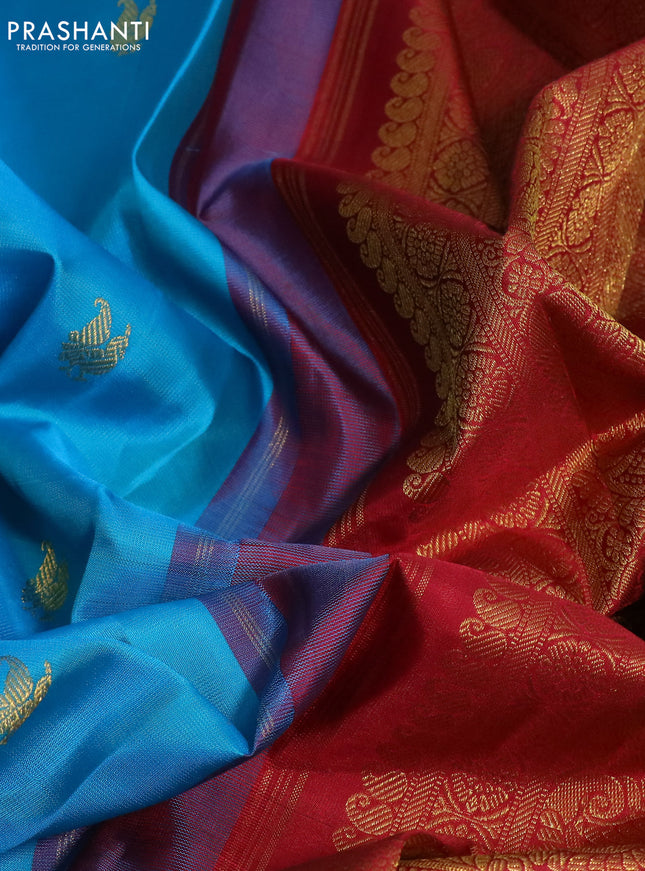 Pure kanchipuram silk saree cs blue and maroon with zari woven buttas and zari woven korvai border